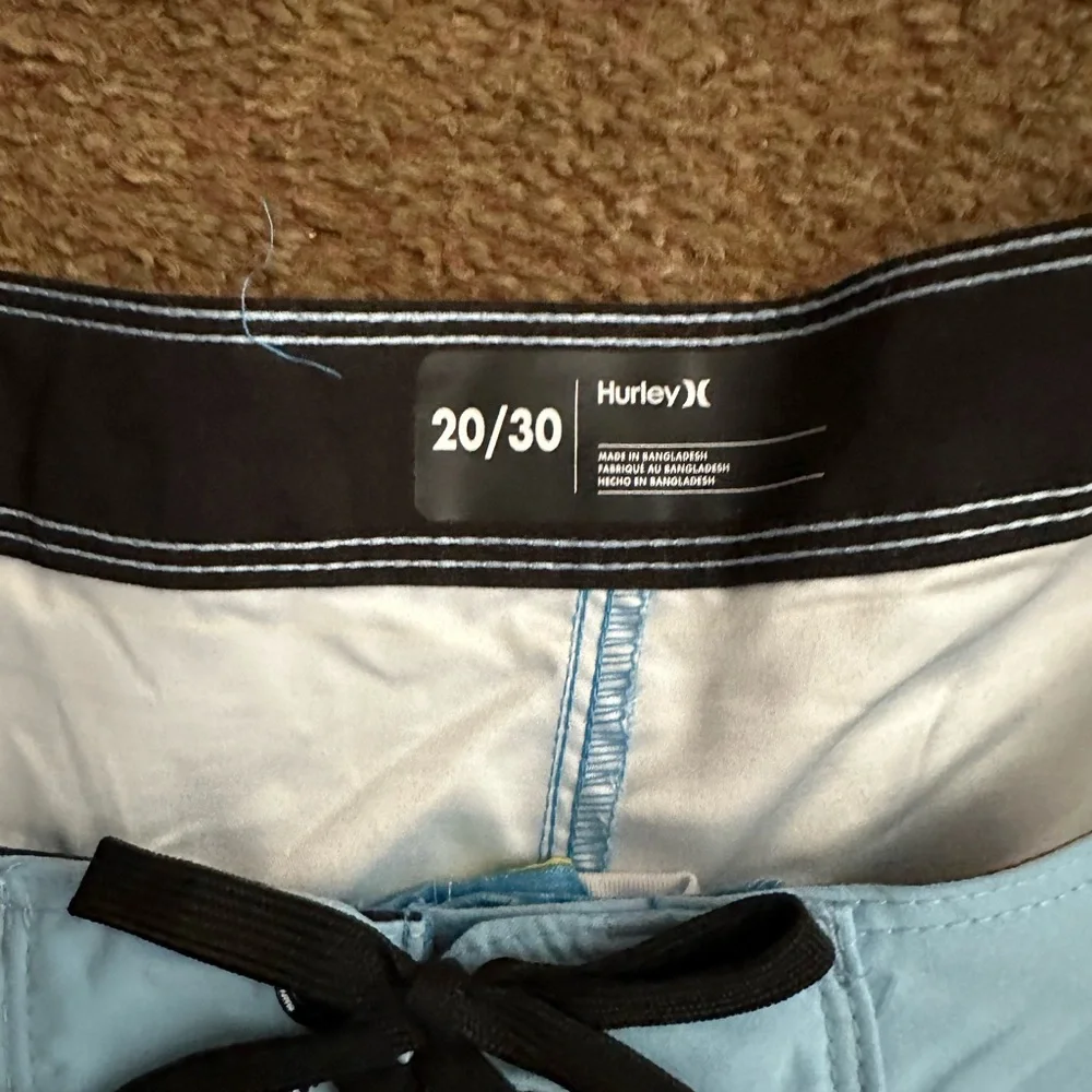 Hurley size 20 blue stripped board beach shorts